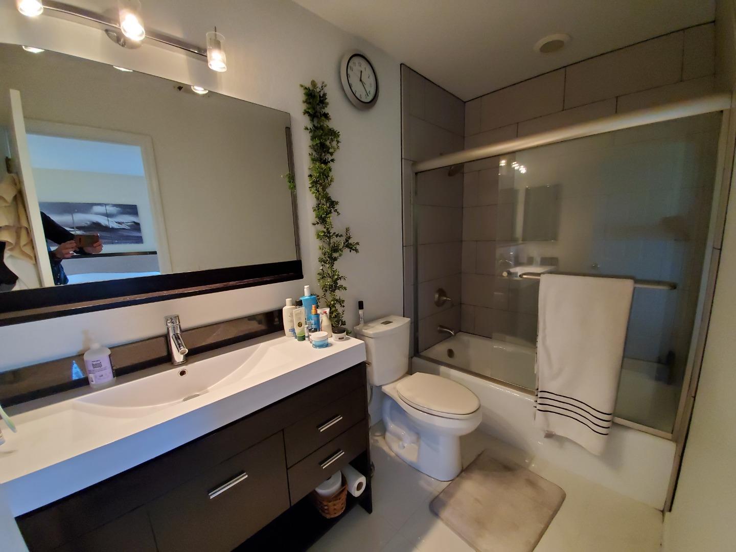 13 Merion Road Half Moon Bay, CA 94019 - Photo 12 of 14 a bathroom with a double vanity sink toilet and shower