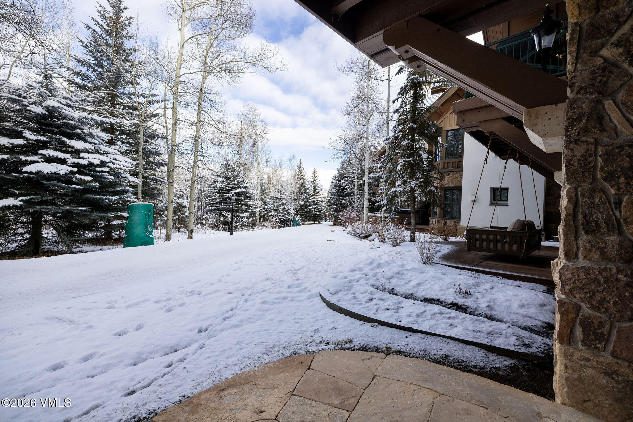 63 Avondale Lane, Unit R1 Beaver Creek, CO 81620 - Photo 27 of 37 2602_villas_at_bc_r1_exterior_patio_b