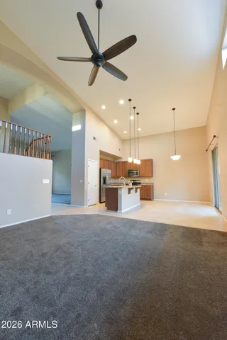 a view of a kitchen and a window
