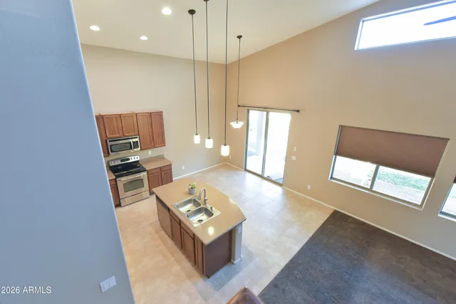 a living room with furniture and a table