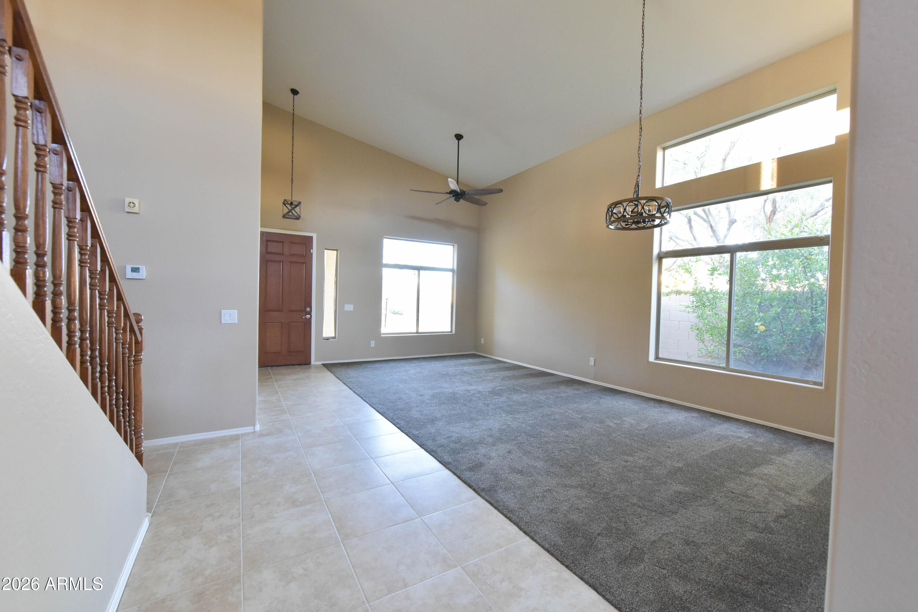 2546 East San Rafael Trail Casa Grande, AZ 85194 - Photo 5 of 41 a view of an empty room with a window