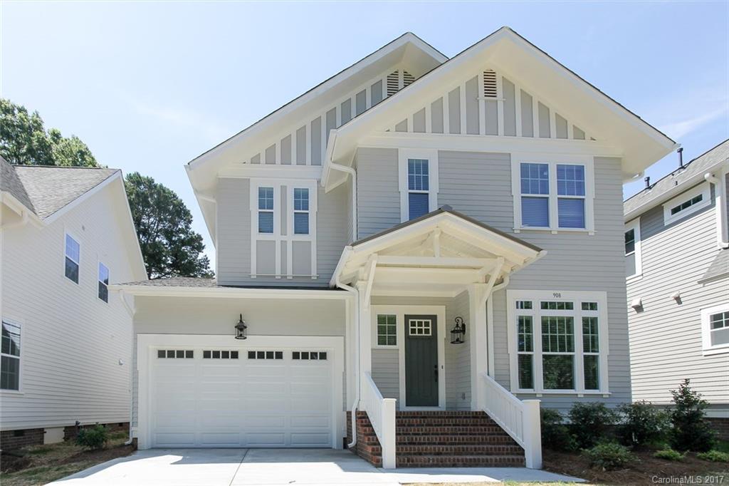 908 Millbrook Road, Unit B Charlotte, NC 28211 - Photo 1 of 23 a front view of a house with a yard