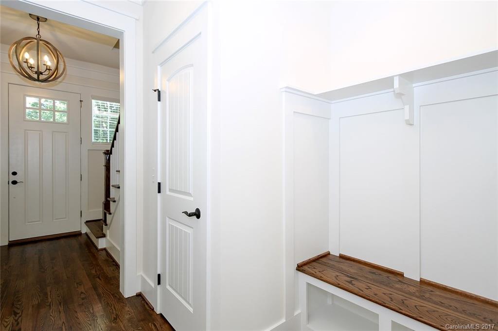 908 Millbrook Road, Unit B Charlotte, NC 28211 - Photo 12 of 23 a view of hallway with wooden floor