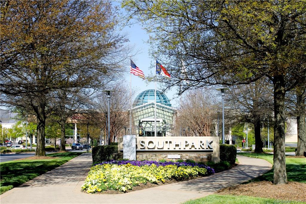 908 Millbrook Road, Unit B Charlotte, NC 28211 - Photo 18 of 23 a view of fountain with a big yard and large trees