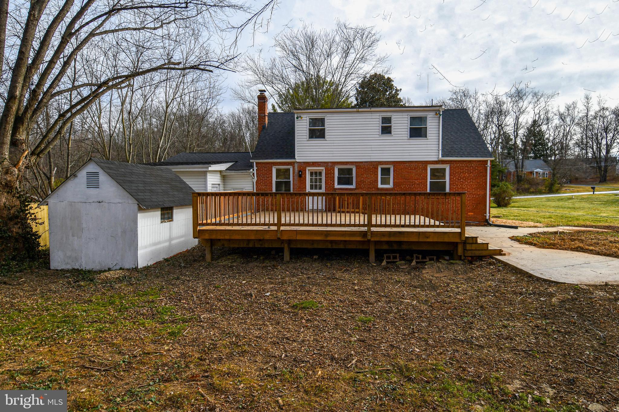 26904 Overlook Street Damascus, MD 20872 - Photo 3 of 54 a view of a house with a yard