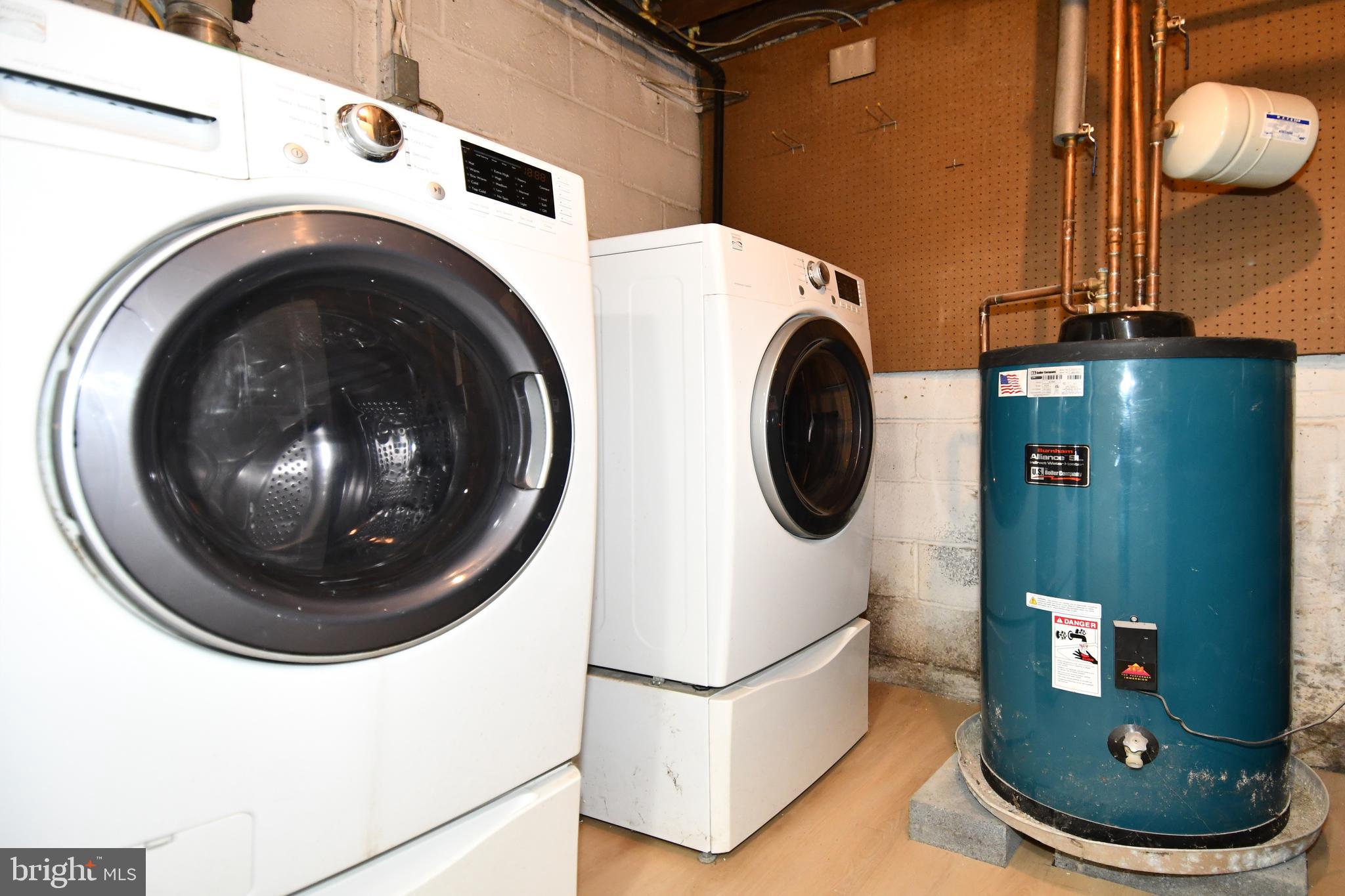 26904 Overlook Street Damascus, MD 20872 - Photo 46 of 54 a utility room with dryer and washer
