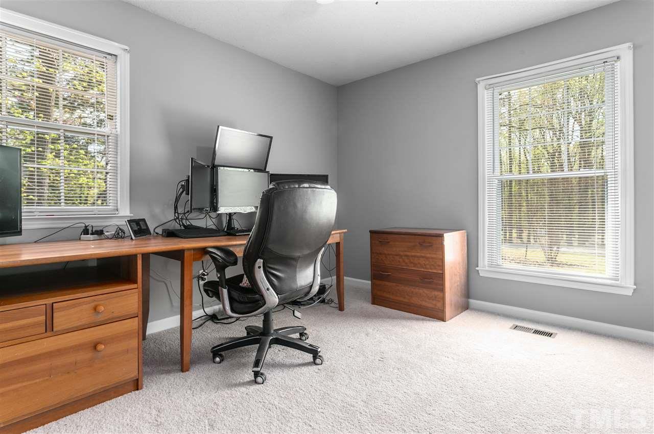 910 Prologue Road Durham, NC 27712 - Photo 14 of 26 a view of workspace with wooden floor windows