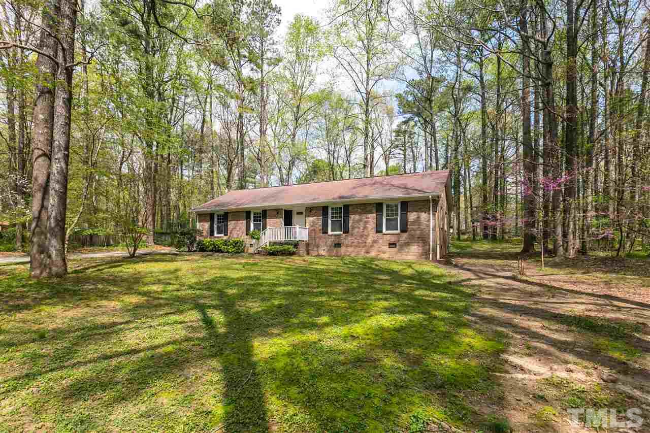 910 Prologue Road Durham, NC 27712 - Photo 3 of 26 a front view of a house with a garden