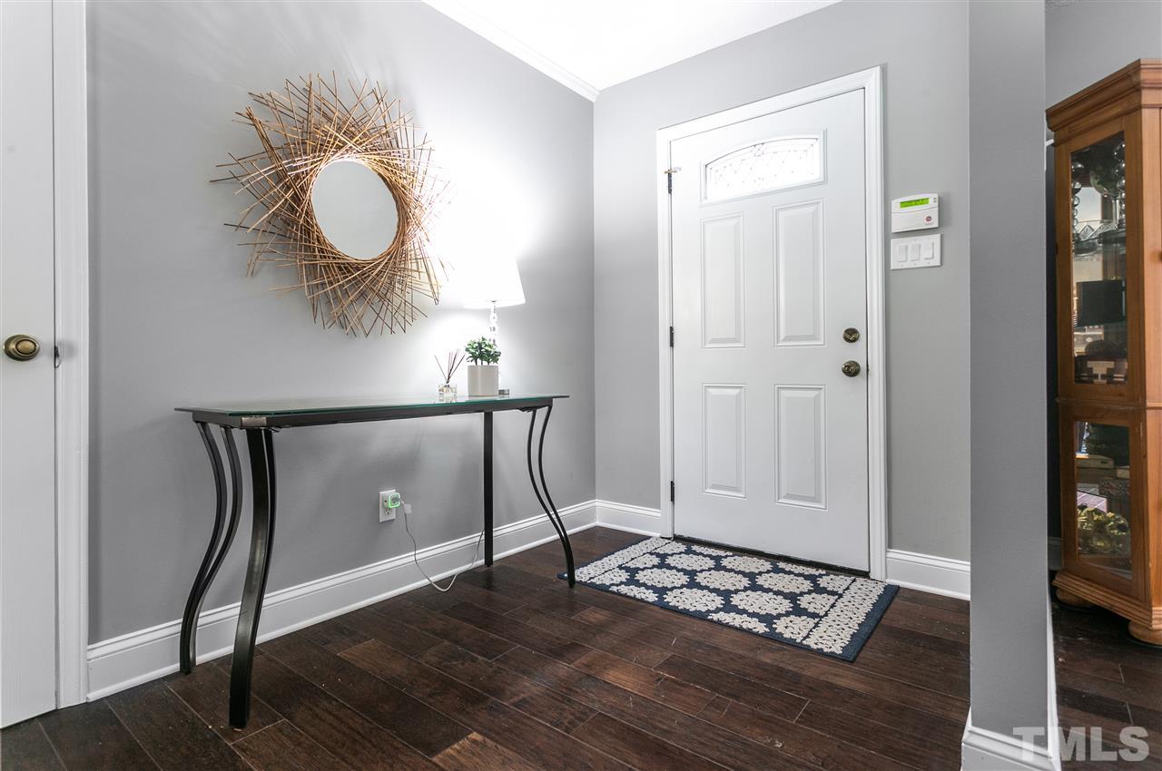 910 Prologue Road Durham, NC 27712 - Photo 8 of 26 a view of entryway with wooden floor