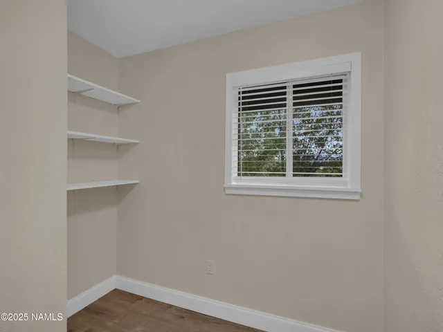 an aerial view of residential house with outdoor space and mountain view