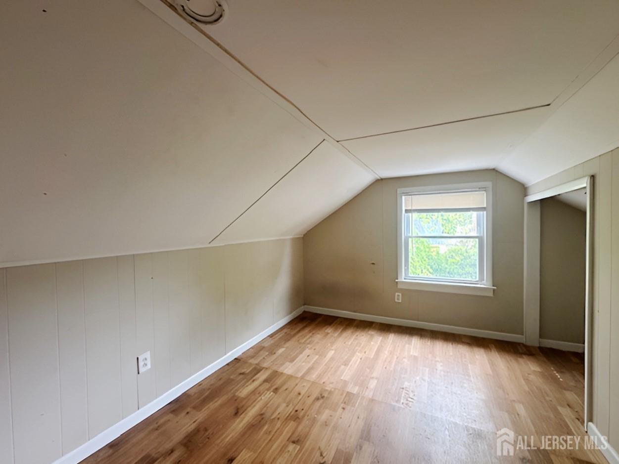 20 Mabel Street Ewing, NJ 08638 - Photo 20 of 31 an empty room with wooden floor and windows