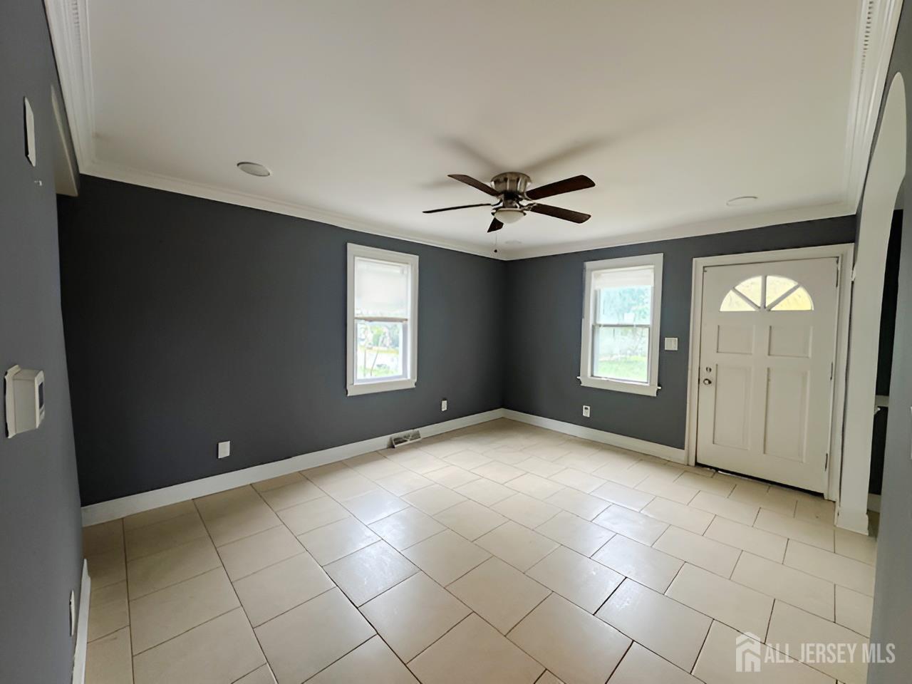 20 Mabel Street Ewing, NJ 08638 - Photo 6 of 31 a view of an empty room with a window