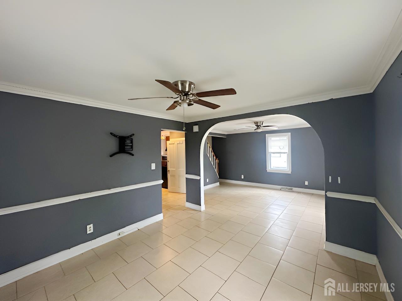 20 Mabel Street Ewing, NJ 08638 - Photo 9 of 31 a view of a livingroom with a ceiling fan and window
