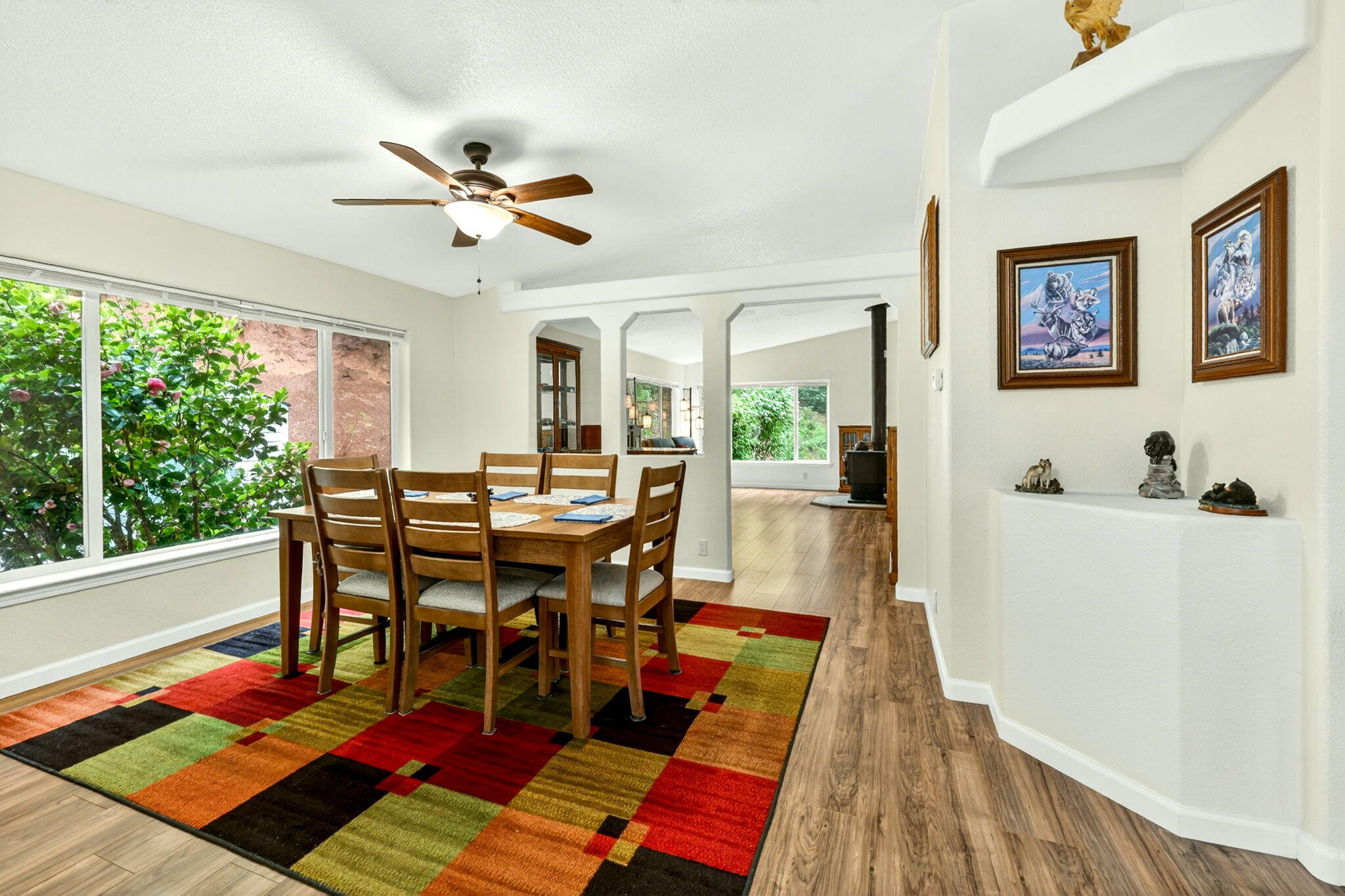 5445 Thompson Creek Road Selma, OR 97538 - Photo 17 of 57 a view of a dining room with furniture window and wooden floor