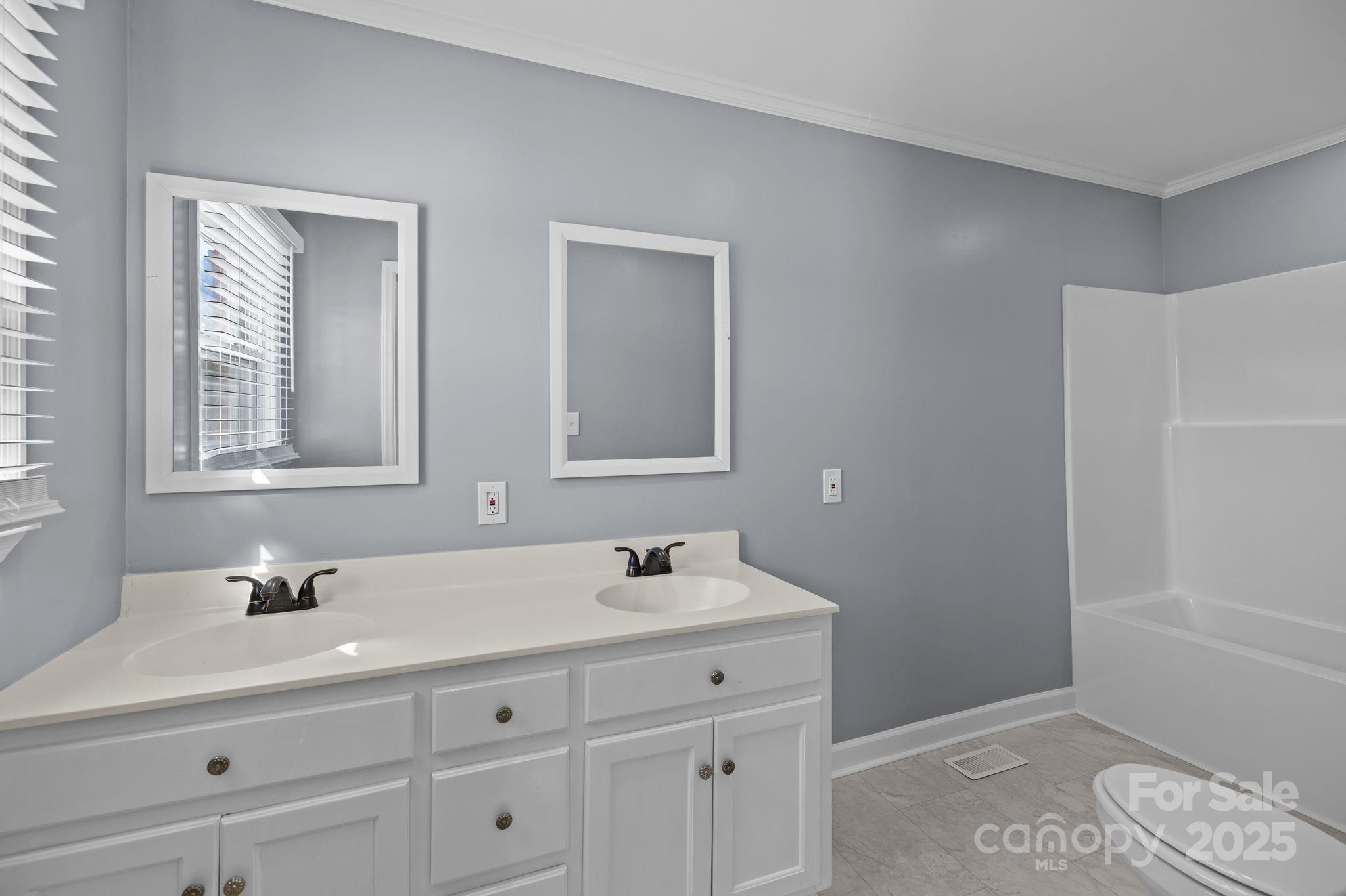 1804 Bennett Road Lancaster, SC 29720 - Photo 17 of 41 a bathroom with a sink and a mirror