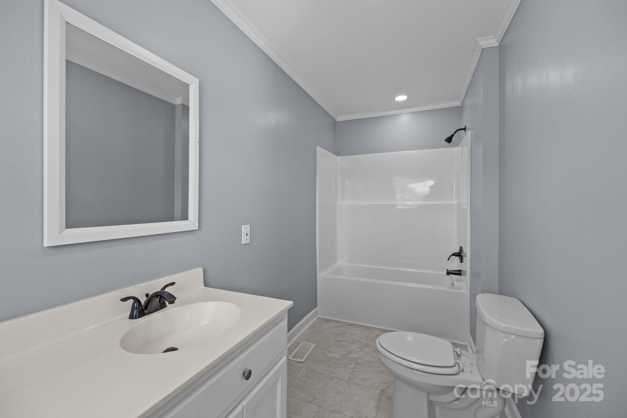 1804 Bennett Road Lancaster, SC 29720 - Photo 18 of 41 a bathroom with a sink toilet and shower