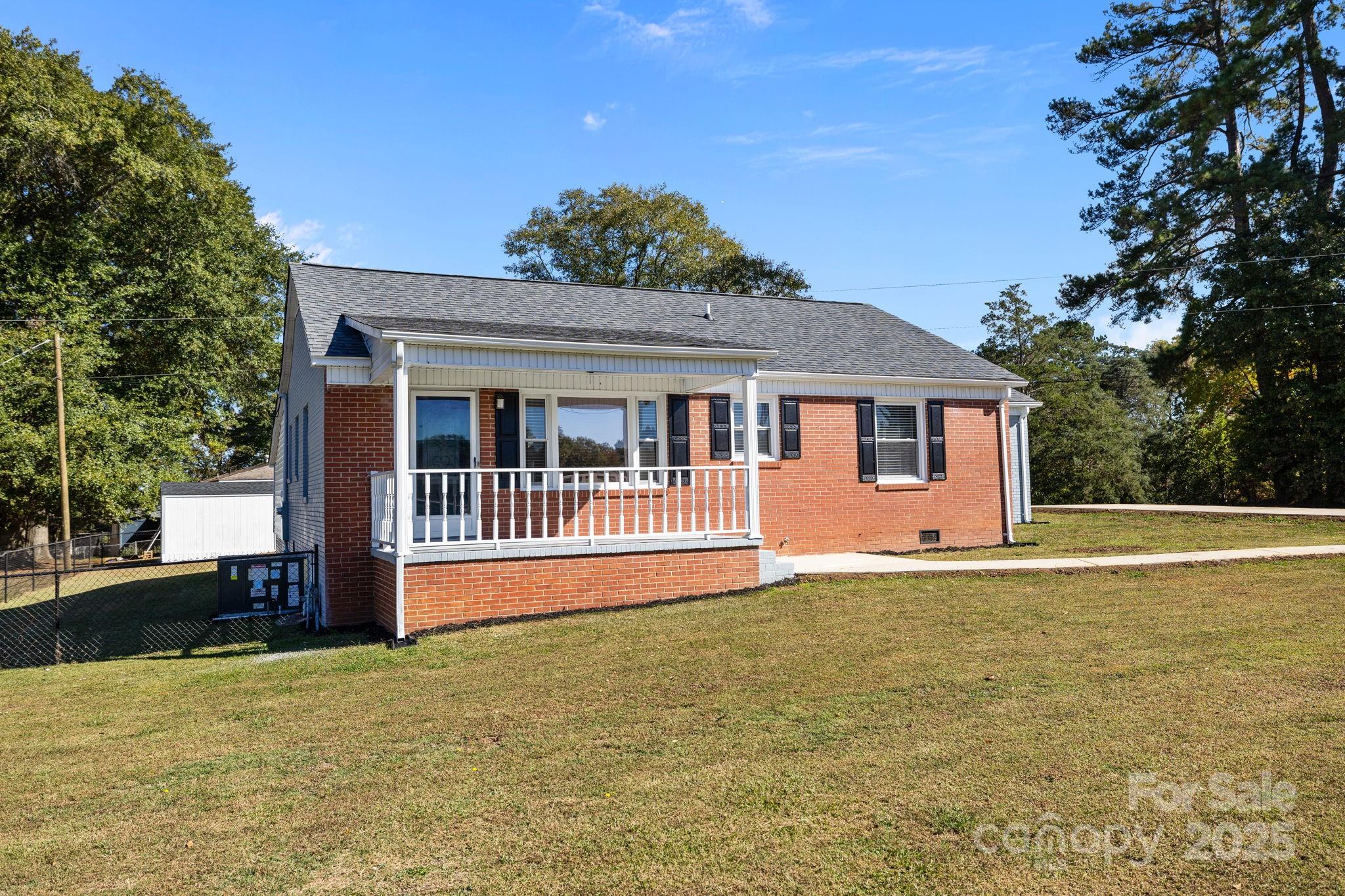1804 Bennett Road Lancaster, SC 29720 - Photo 2 of 41 a front view of a house with a garden