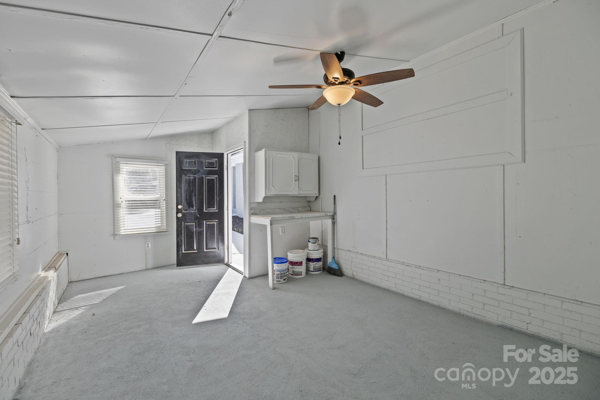 1804 Bennett Road Lancaster, SC 29720 - Photo 26 of 41 a view of a livingroom with a furniture and a ceiling fan