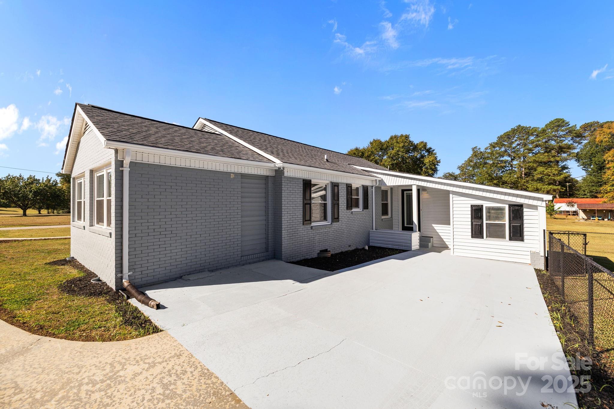1804 Bennett Road Lancaster, SC 29720 - Photo 27 of 41 a front view of a house with a yard