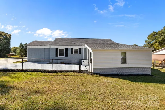 a view of a house with a swimming pool