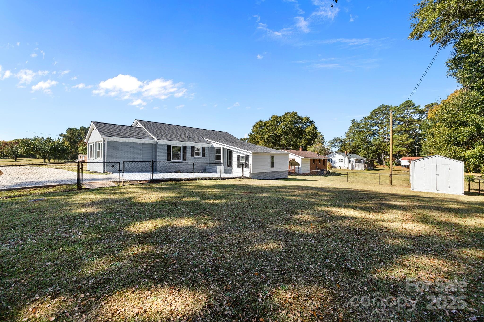 1804 Bennett Road Lancaster, SC 29720 - Photo 31 of 41 a view of a house with a swimming pool