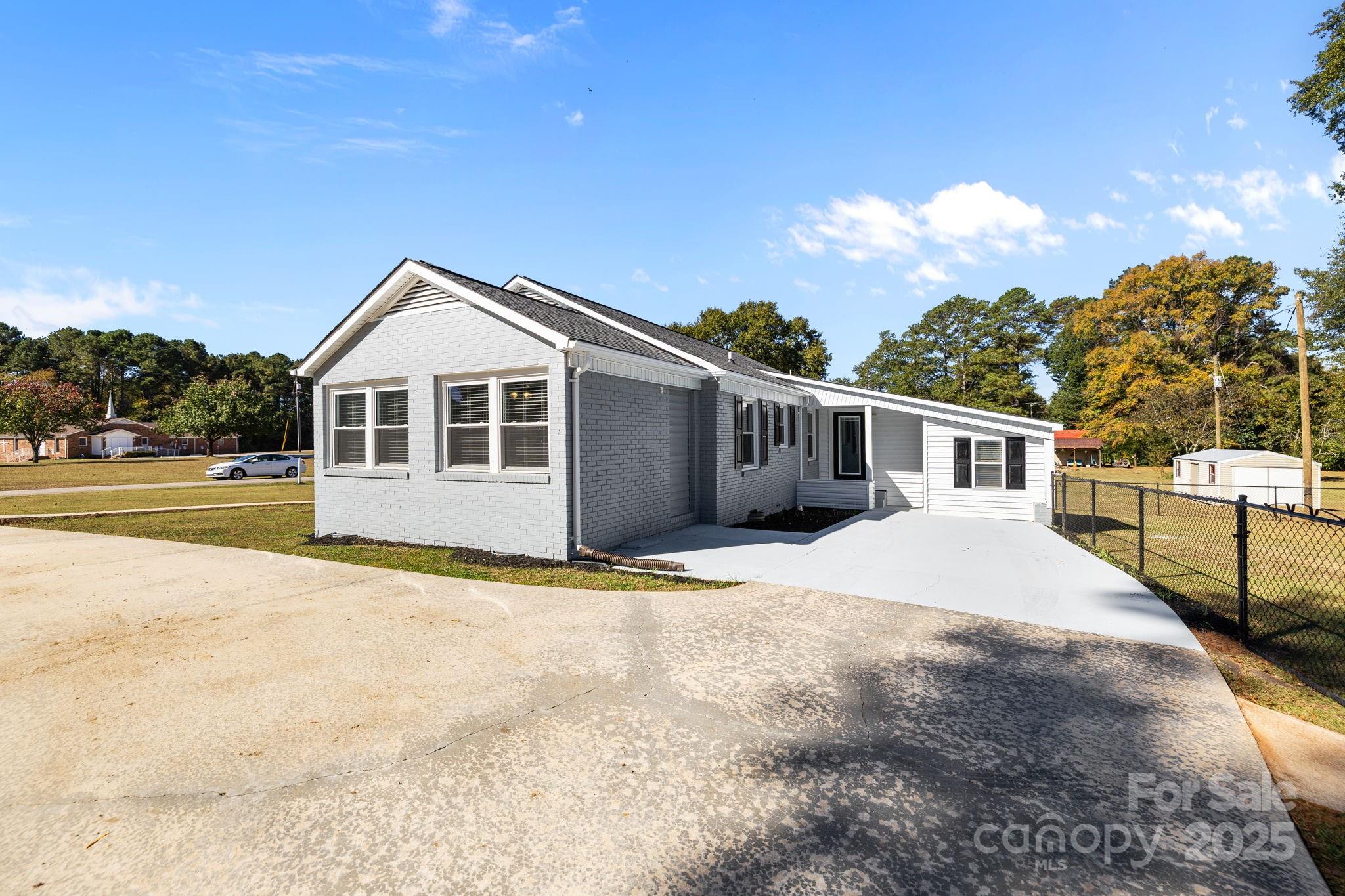1804 Bennett Road Lancaster, SC 29720 - Photo 32 of 41 a front view of a house with a yard