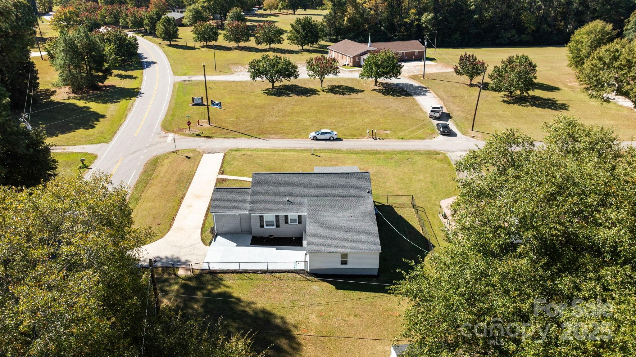 1804 Bennett Road Lancaster, SC 29720 - Photo 35 of 41 an aerial view of a house with swimming pool and ocean view