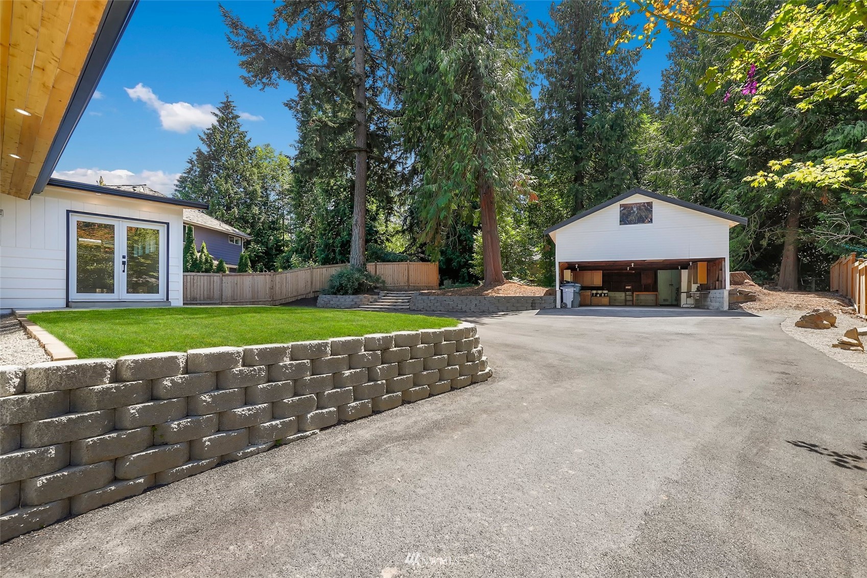 23314 25th Drive Southeast Bothell, WA 98021 - Photo 31 of 40 a front view of a house with a yard and garage