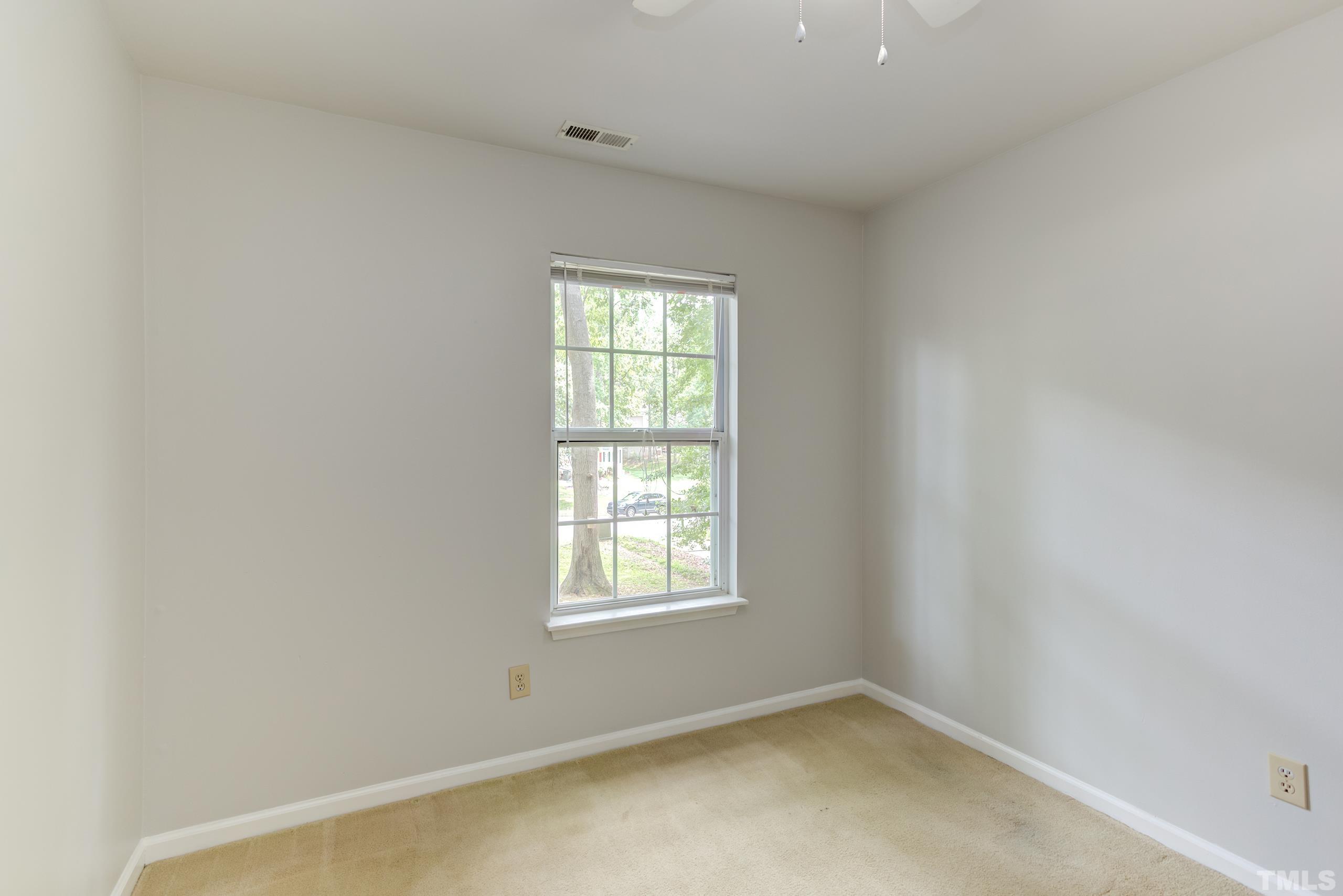 206 Eagle Tavern Drive Garner, NC 27529 - Photo 20 of 41 an empty room with a window