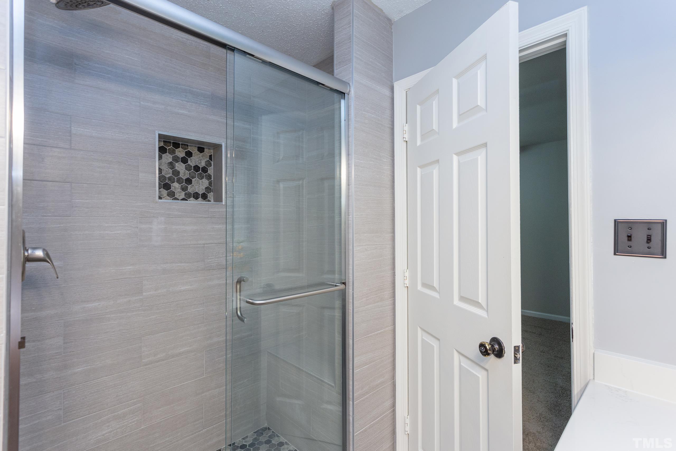 206 Eagle Tavern Drive Garner, NC 27529 - Photo 29 of 41 a bathroom with a shower