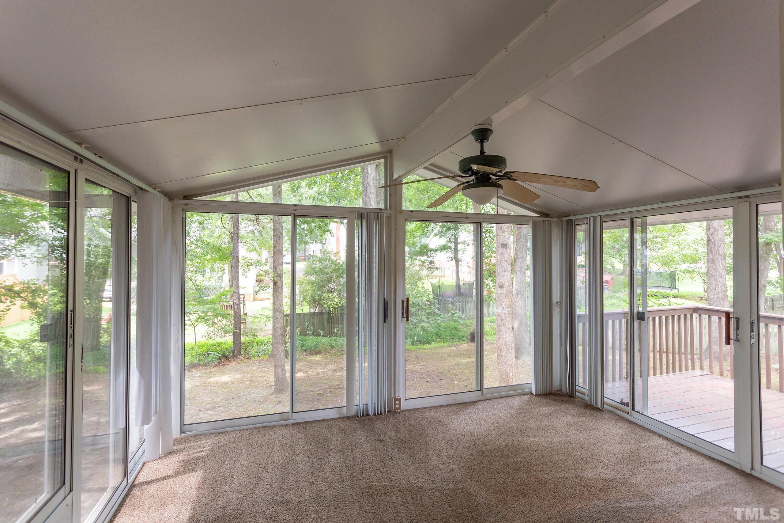206 Eagle Tavern Drive Garner, NC 27529 - Photo 30 of 41 a view of empty room with floor to ceiling window