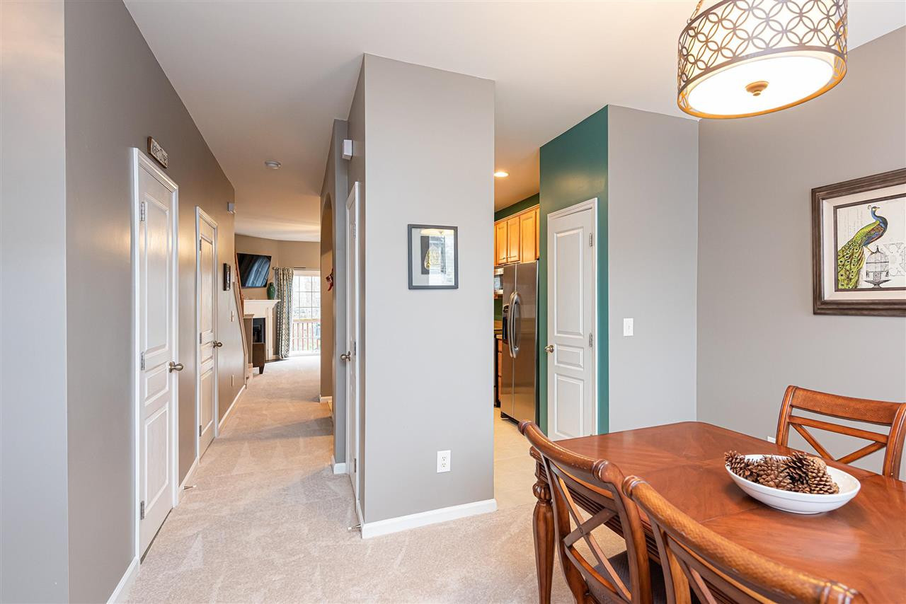 7749 Winners Edge Street Raleigh, NC 27617 - Photo 3 of 29 Access to main hallway and into the Kitchen from Dining Area. Dining Room