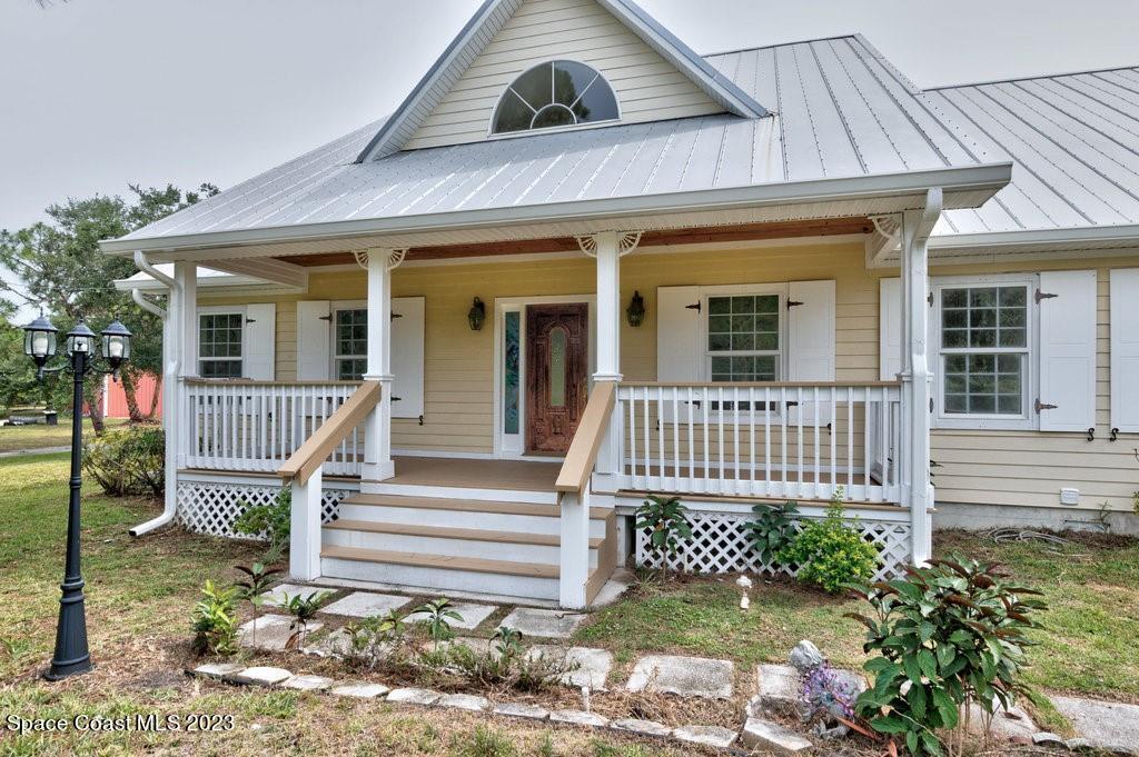 9335 Fleming Grant Road Micco, FL 32976 - Photo 2 of 36 6