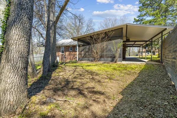 a front view of a house with yard