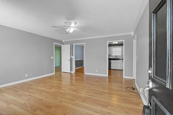 a kitchen with stainless steel appliances granite countertop a sink and cabinets