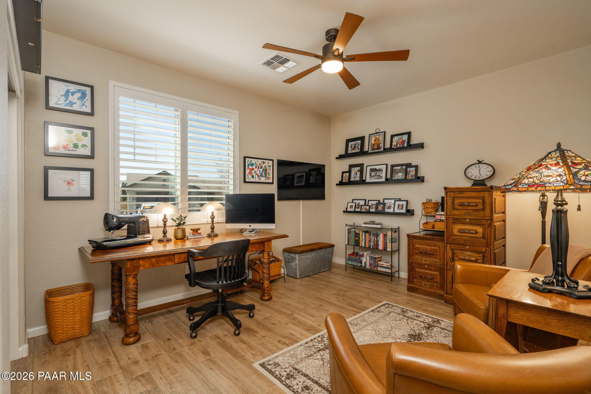 707 Lunar View Way Chino Valley, AZ 86323 - Photo 14 of 89 a living room with furniture a flat screen tv and a window