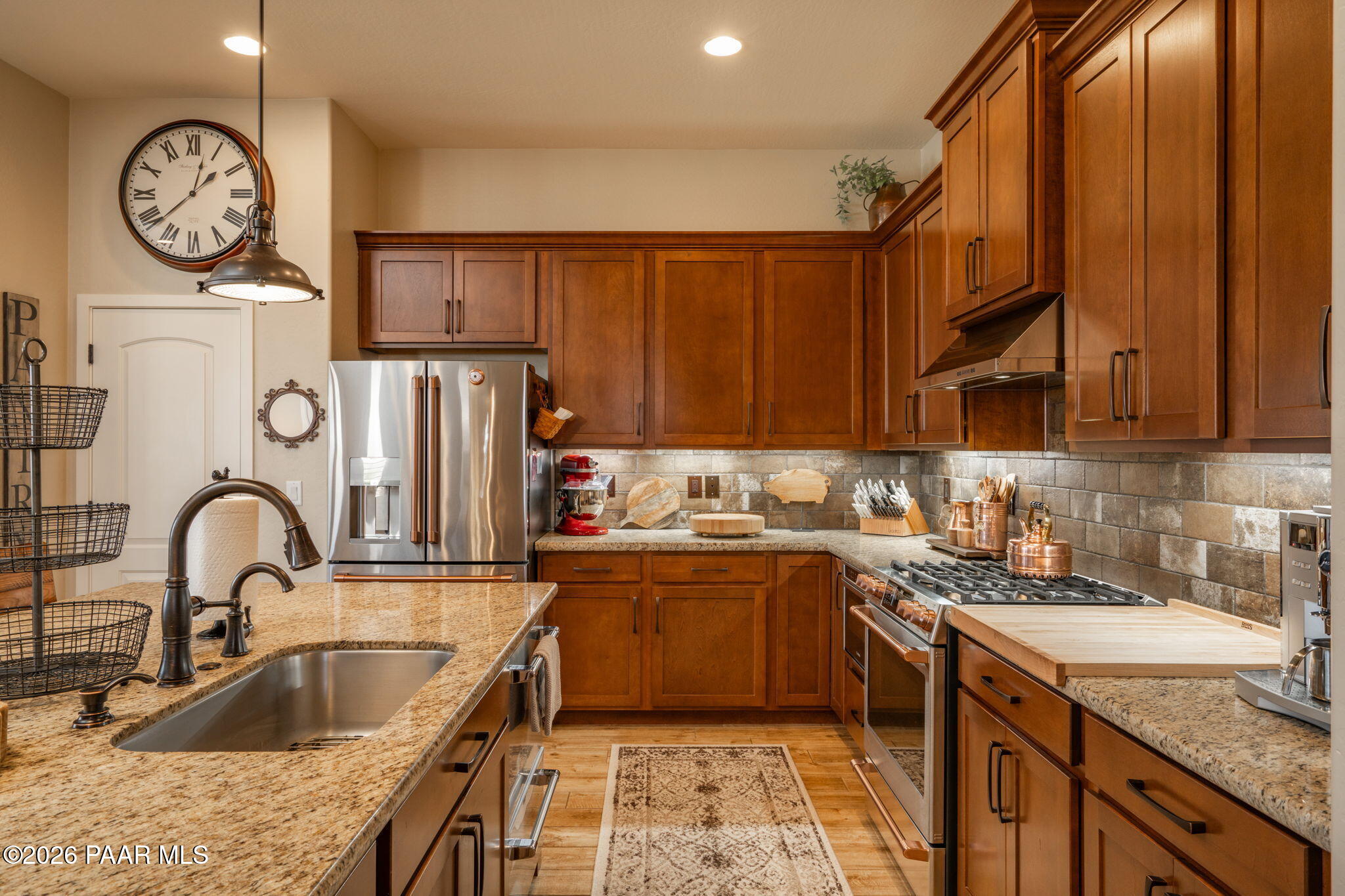 707 Lunar View Way Chino Valley, AZ 86323 - Photo 25 of 89 a kitchen with a sink cabinets and stainless steel appliances