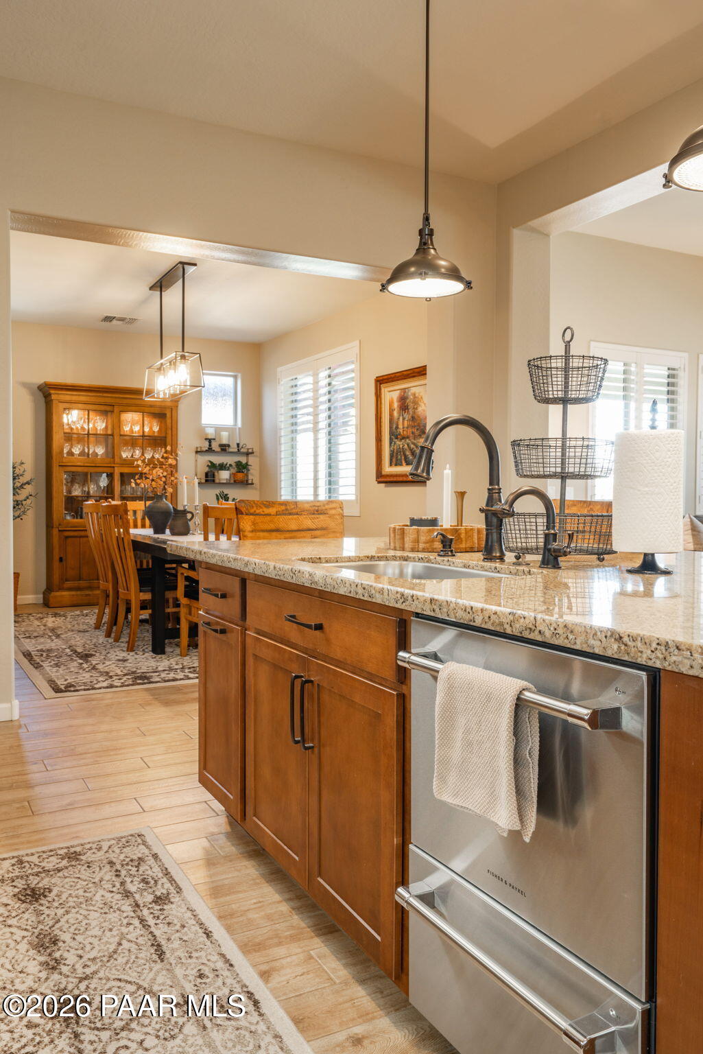 707 Lunar View Way Chino Valley, AZ 86323 - Photo 29 of 89 a kitchen with stainless steel appliances granite countertop a stove a sink and a refrigerator