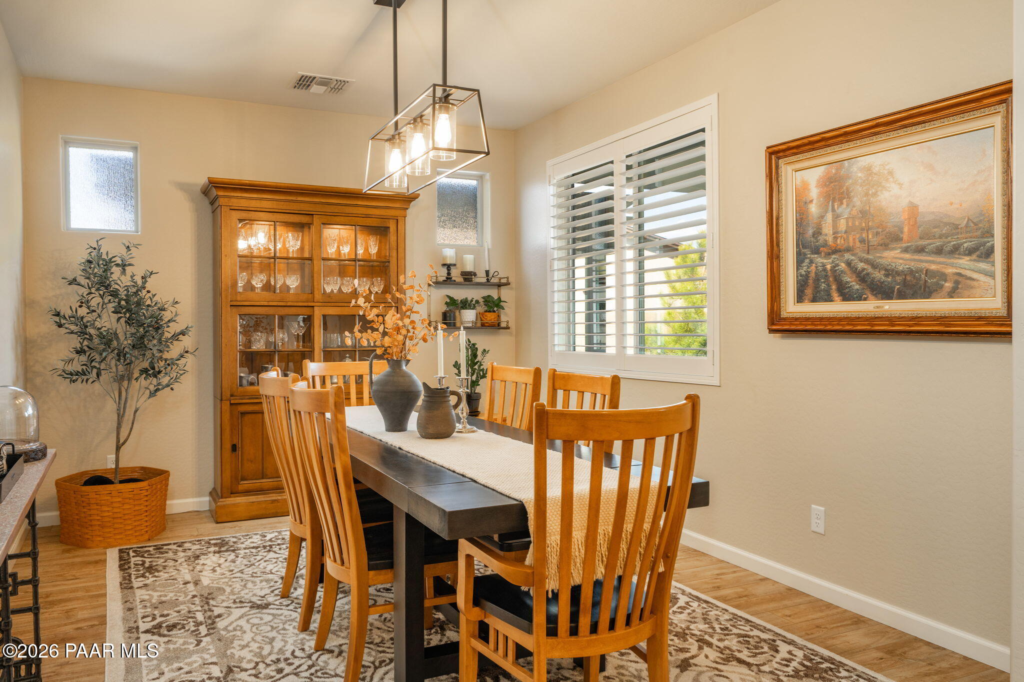 707 Lunar View Way Chino Valley, AZ 86323 - Photo 30 of 89 a view of a dining room with furniture window and outside view