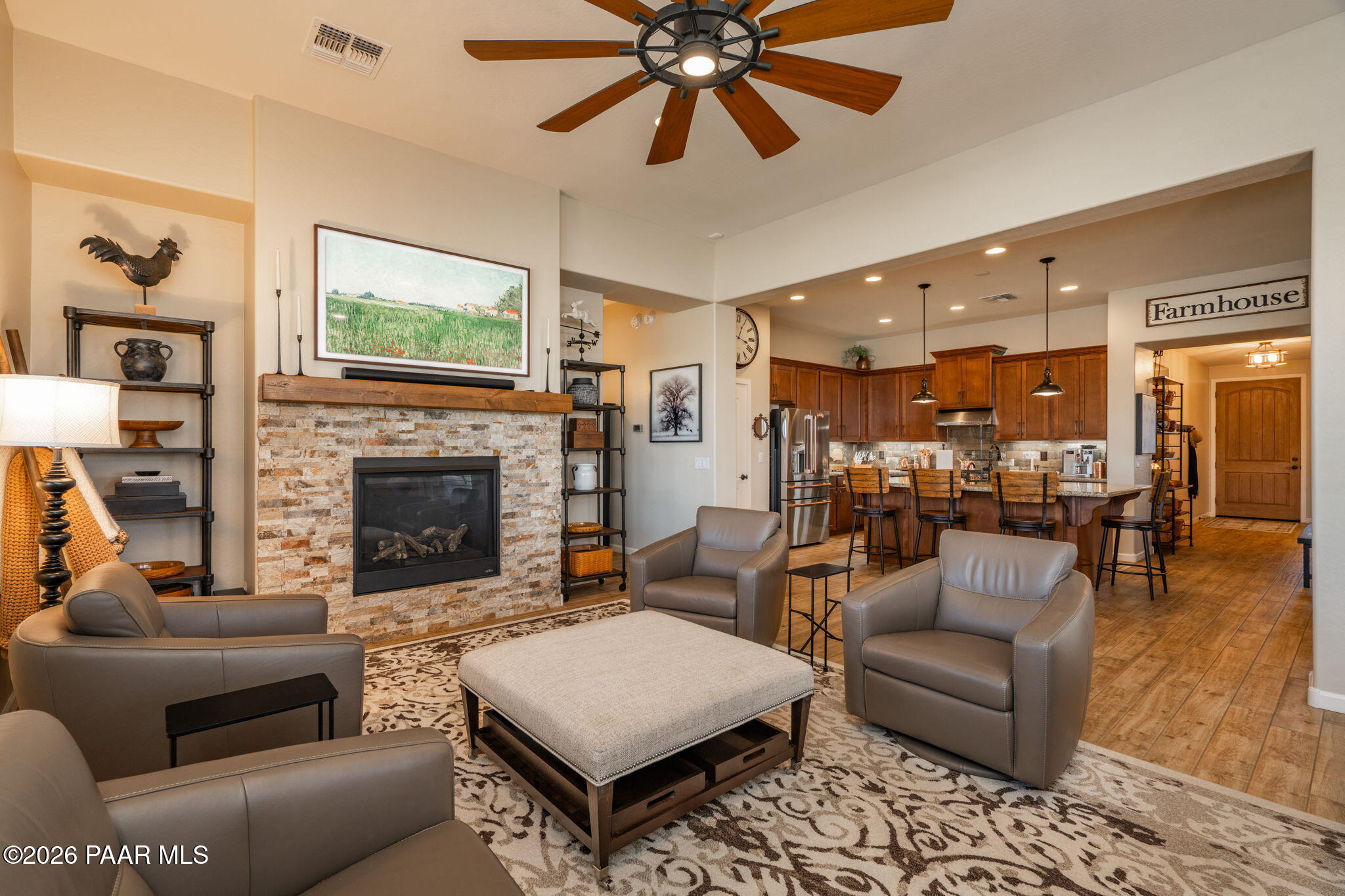 707 Lunar View Way Chino Valley, AZ 86323 - Photo 35 of 89 a living room with furniture and a fireplace