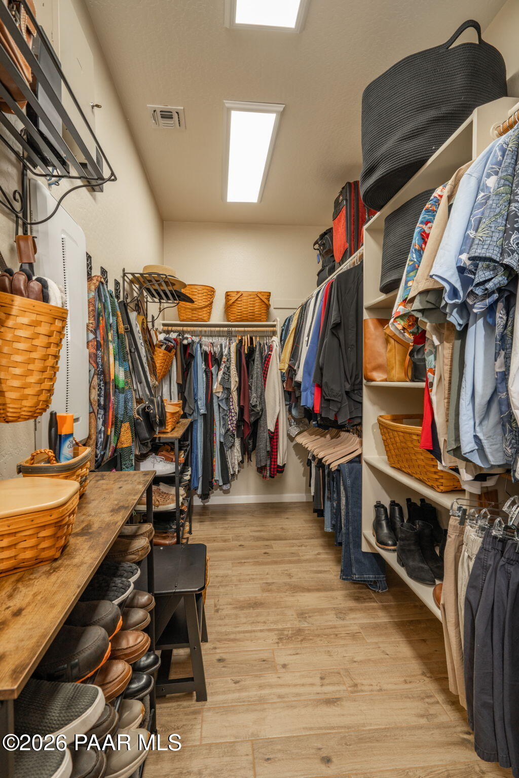707 Lunar View Way Chino Valley, AZ 86323 - Photo 45 of 89 a view of walk in closet with clothes and shoes