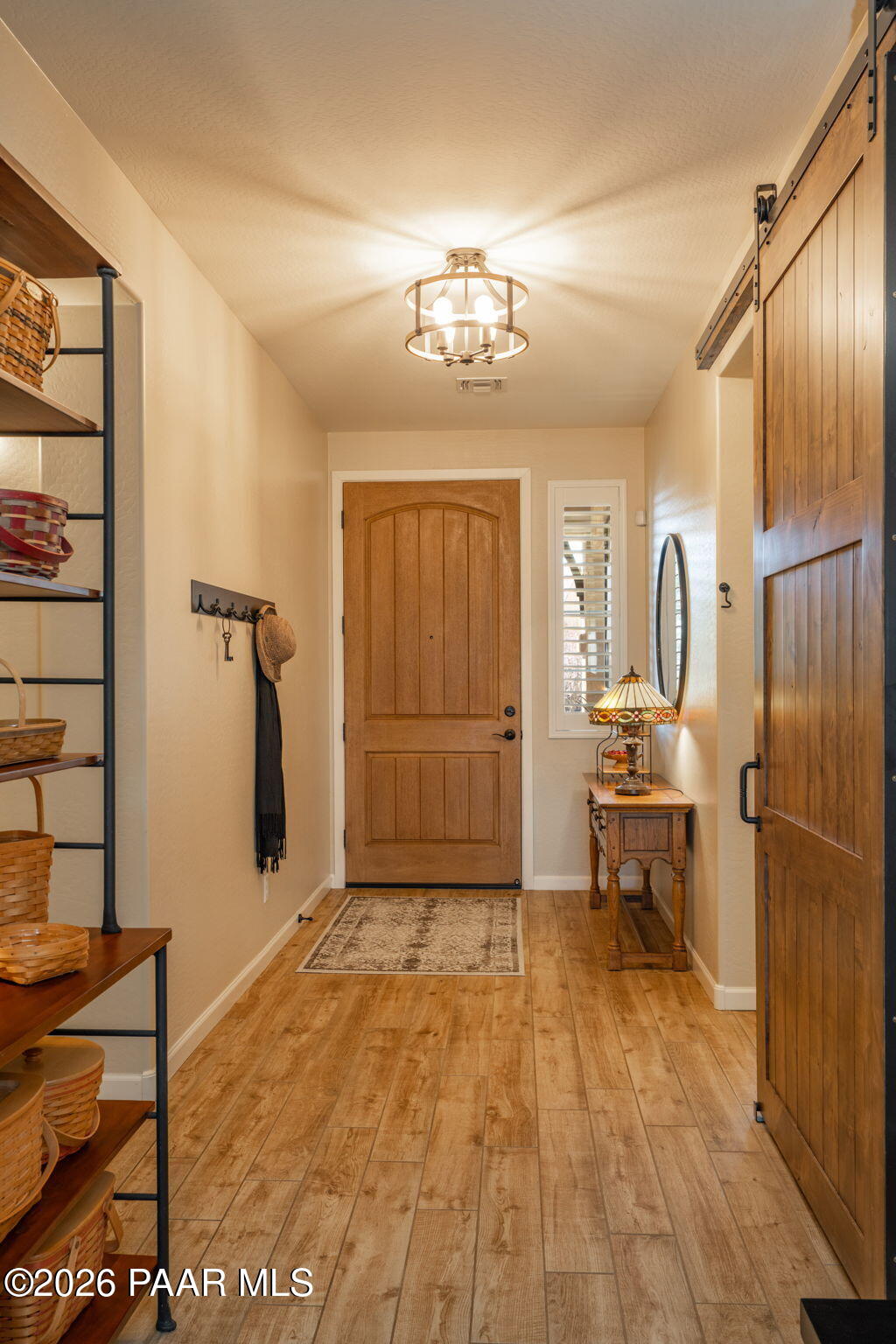 707 Lunar View Way Chino Valley, AZ 86323 - Photo 10 of 89 a view of a hallway with workspace and a mirror