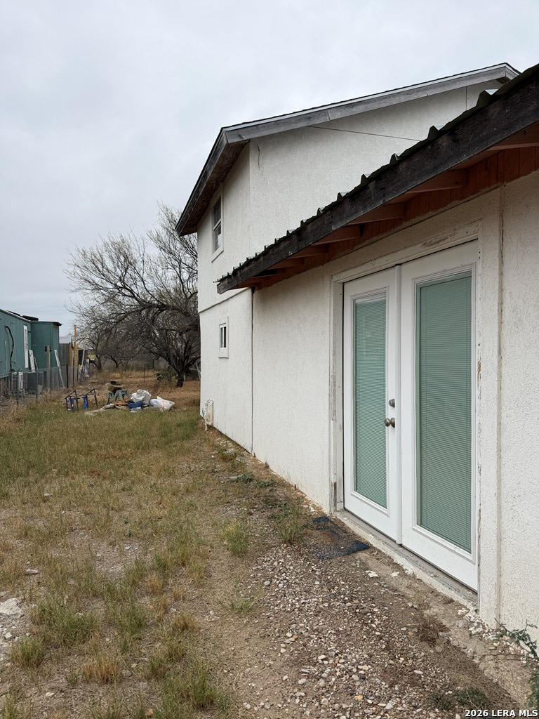 3148 Leonel Street Eagle Pass, TX 78852 - Photo 13 of 18 a house with trees in front of it