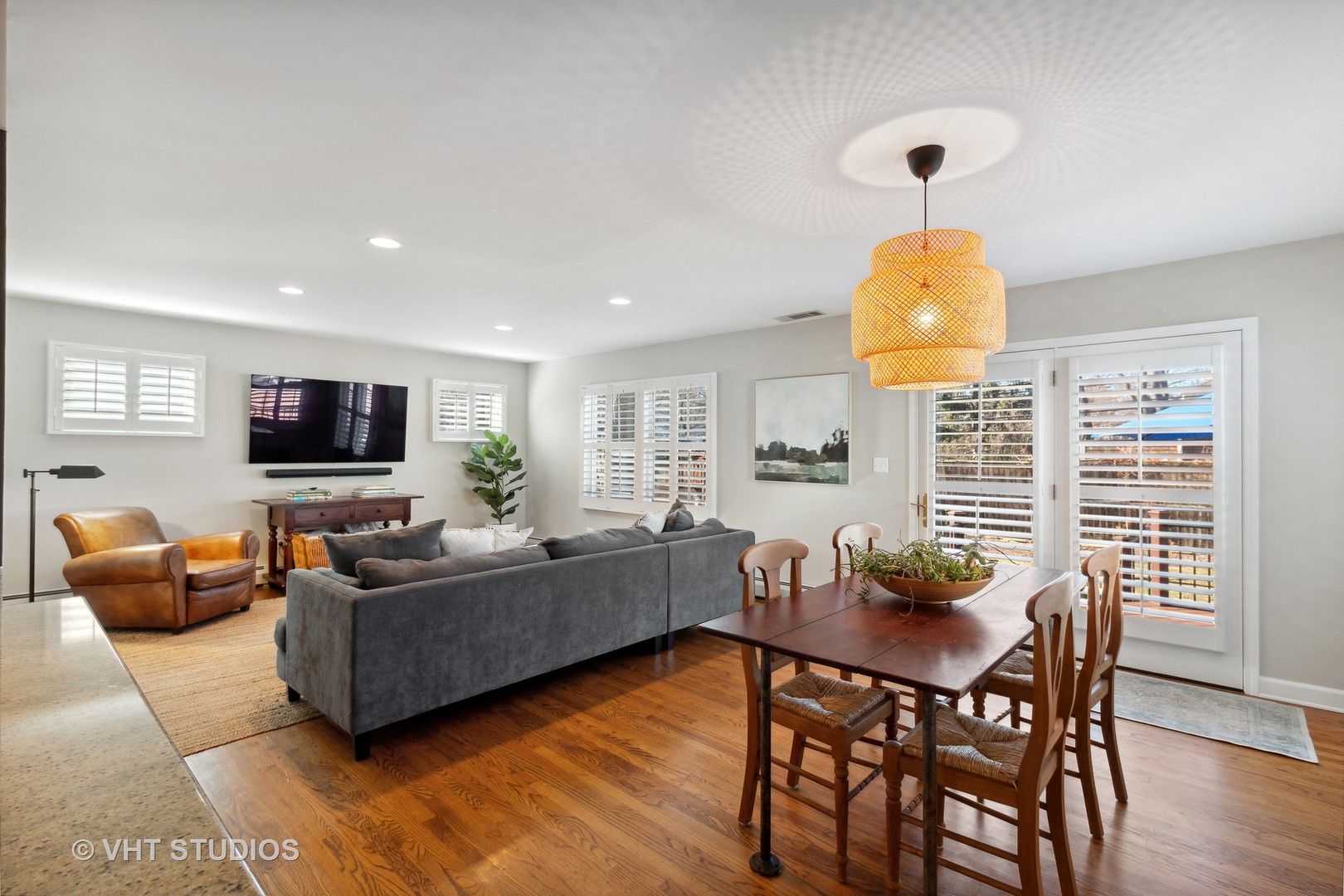 700 Juniper Road Glenview, IL 60025 - Photo 11 of 34 a view of a dining room with furniture and wooden floor