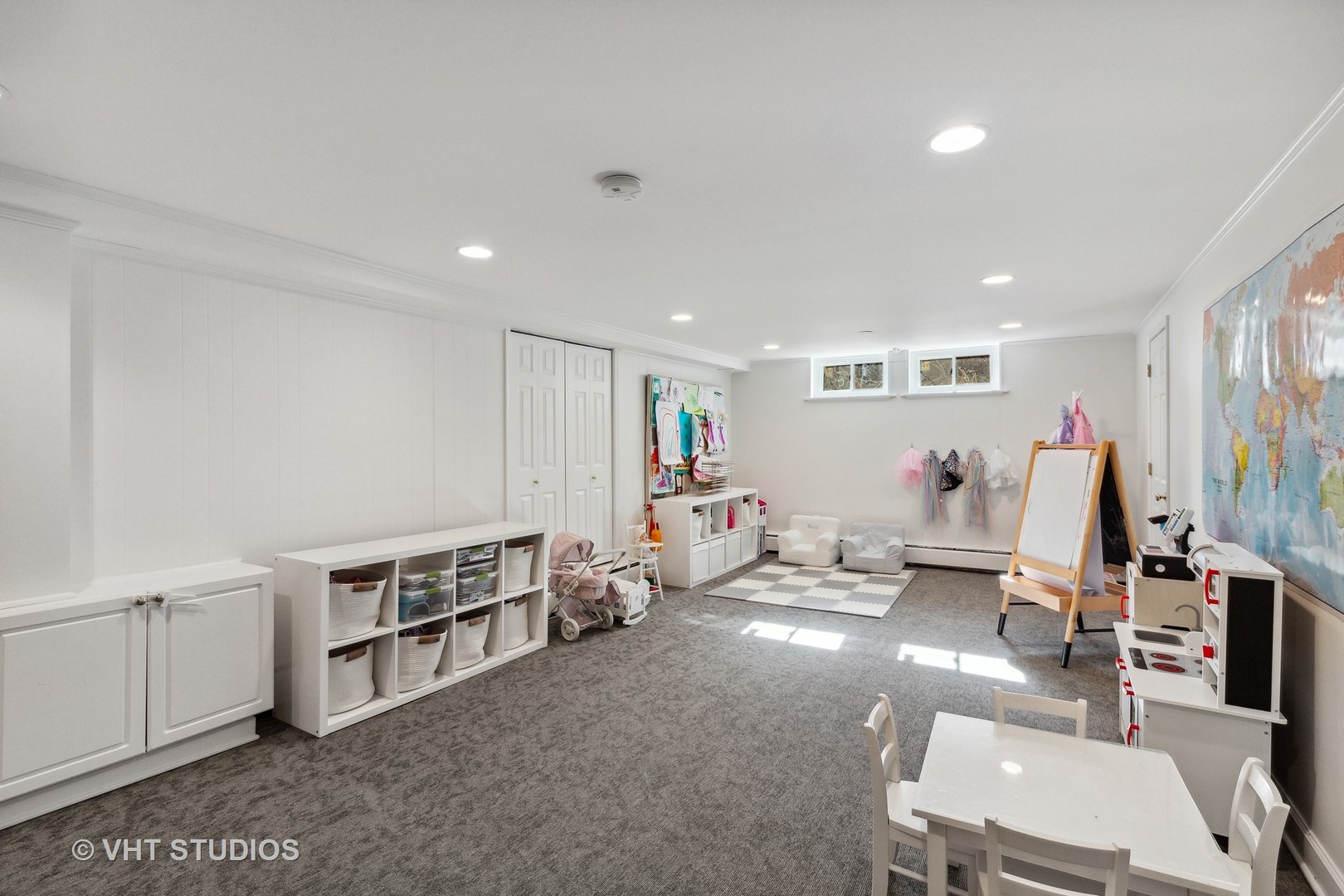 700 Juniper Road Glenview, IL 60025 - Photo 23 of 34 a living room with furniture and a flat screen tv