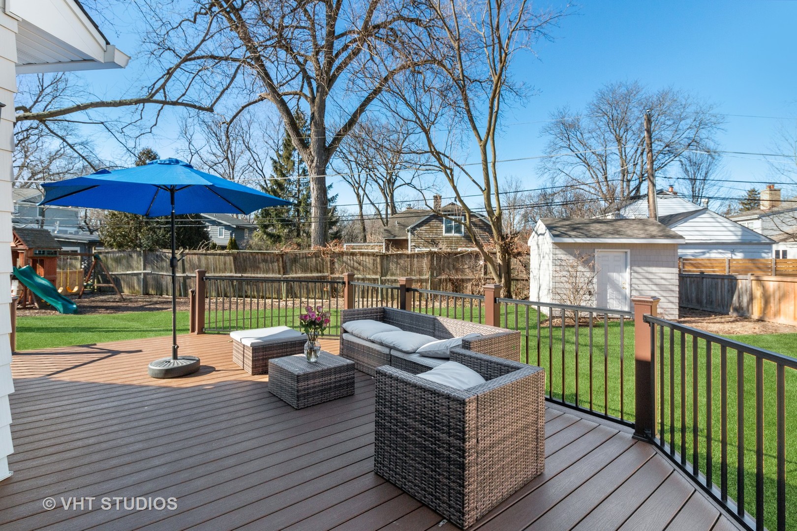 700 Juniper Road Glenview, IL 60025 - Photo 6 of 34 a view of a patio with couches chairs and wooden floor