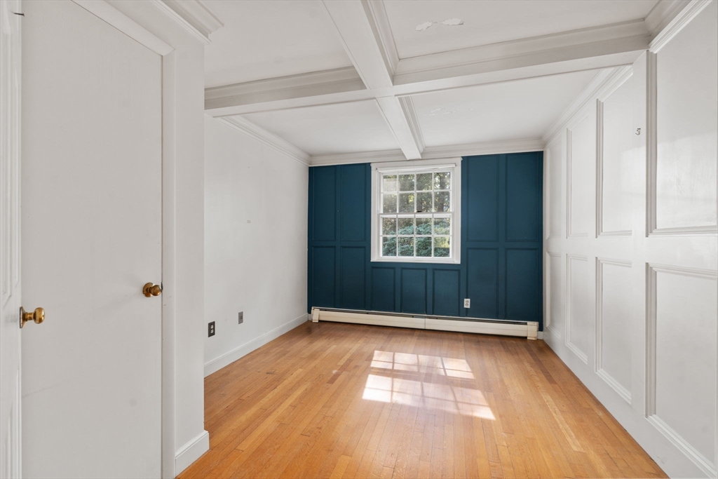 91 Glen Street Natick, MA 01760 - Photo 17 of 39 an empty room with windows