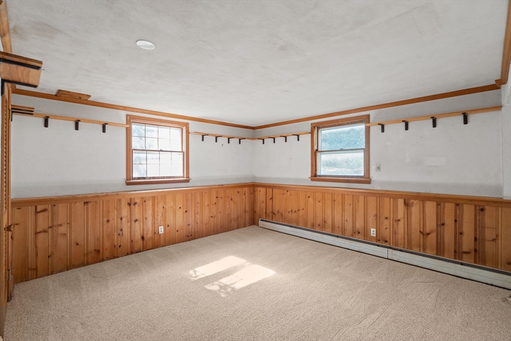 91 Glen Street Natick, MA 01760 - Photo 22 of 39 a view of an empty room with window