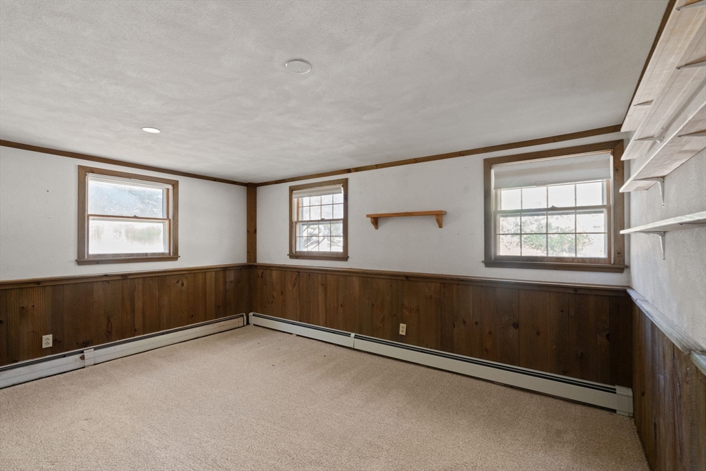 91 Glen Street Natick, MA 01760 - Photo 23 of 39 an empty room with windows