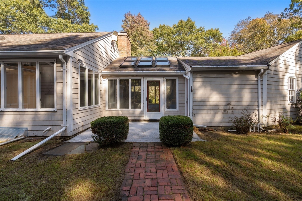 91 Glen Street Natick, MA 01760 - Photo 29 of 39 a view of a house with a patio